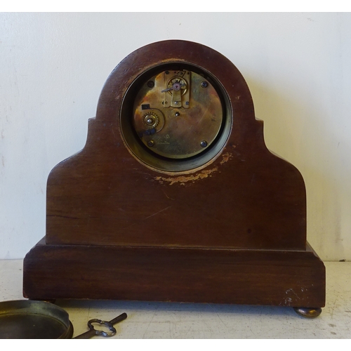 49 - An Edwardian mahogany inlaid mantel clock 26cm wide together with an Edwardian worn Silver plated pe... 