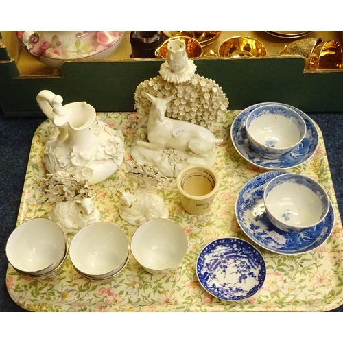 132 - Blue and white teabowls and saucers; Chinese teabowls; a deer in brocage candlestick, a pair of shee... 