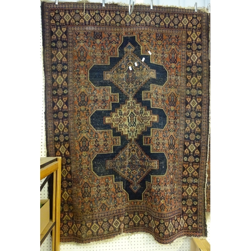 167 - Two Middle Eastern rugs.