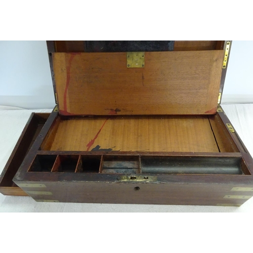 106 - A Victorian mahogany brass bound writing box. 50cm wide