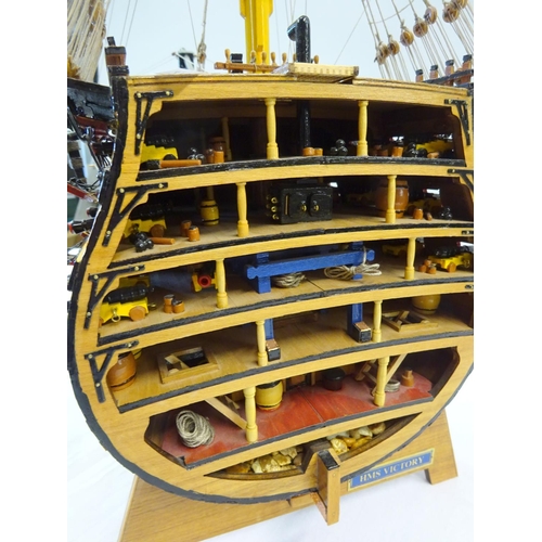 65 - A HMS Victory cross section model ship 48cm tall.