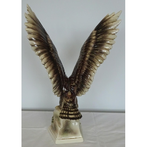 1 - A large ceramic eagle indistinctly marked Austria ? 51cm tall.