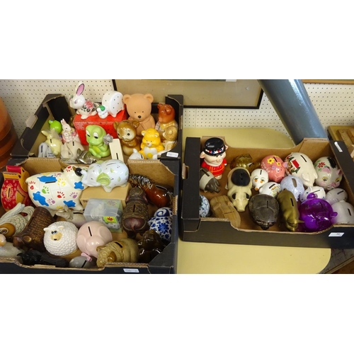 56 - A quantity of various money boxes to include Sylvac dog, Greyshott pottery, Shelf Pottery etc (3)