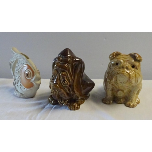 56 - A quantity of various money boxes to include Sylvac dog, Greyshott pottery, Shelf Pottery etc (3)