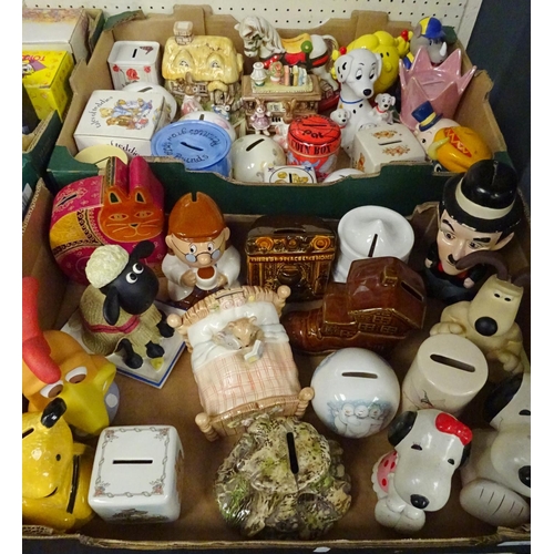 87 - A large quantity of various money boxes to include Royal Doulton Store Stump Money Box, Villeroy & B... 