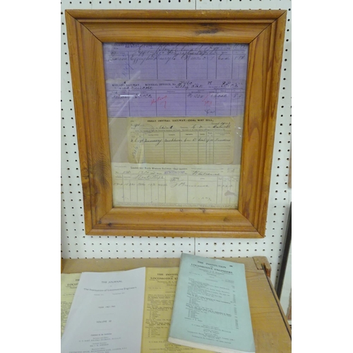 98 - A Railway group to include three framed dockets, engineers journals, L&NWR token, stamp, leather pou... 