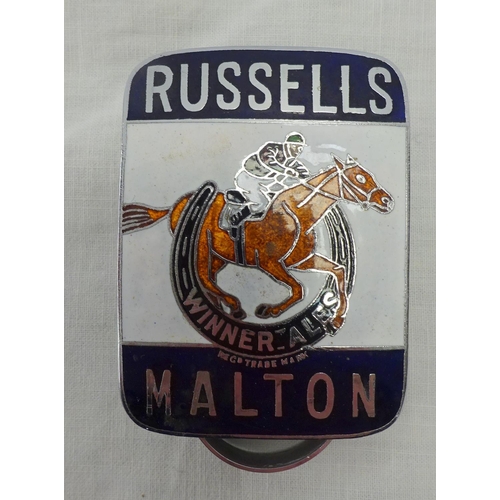 108 - A Russells Malton enamel badge together with a pen knife (2).