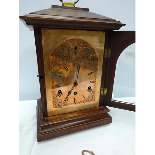 114 - An Edwardian 8 day bracket clock 28cm 46cm high.