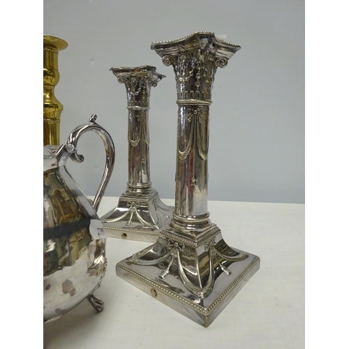 115 - A quantity of various metal wares to include a pair of silver plated candle sticks, large jam pan, s... 