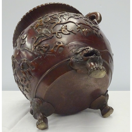 117 - A large bronze Japanese jardiniere, decorated with tree's and bird relief 40cm wide 30cm high.