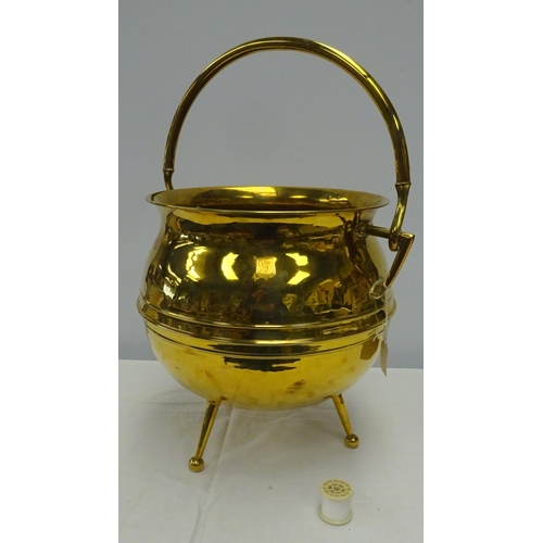 118 - A Brass Arts & Crafts William Souteter, C Dresser style cauldron 40 x 35cm high.