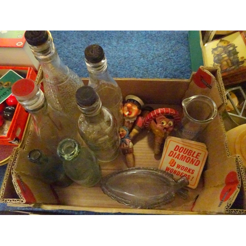 128 - A large quantity of mainly kitchen wares to include advertising bottles & tins, character corks, ken... 