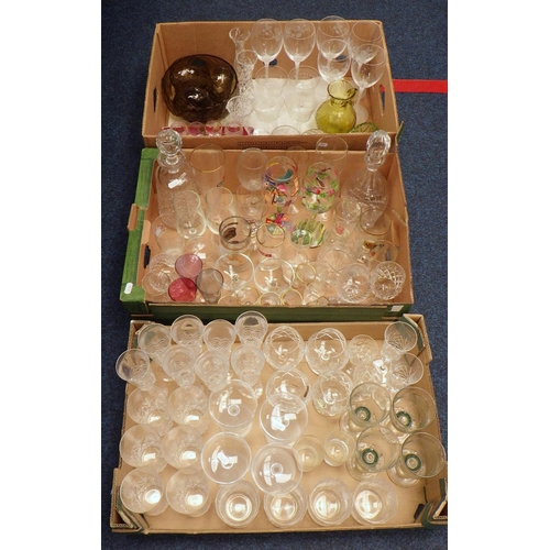 185 - A large quantity of mainly drinking glasses to include a decanter, small vases etc (3).