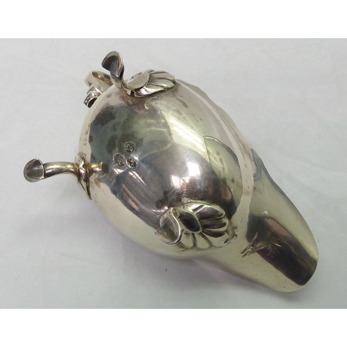 301 - A George III silver sauce boat engraved with a bird & laurel leaf armorial, partial Dublin hallmark.... 