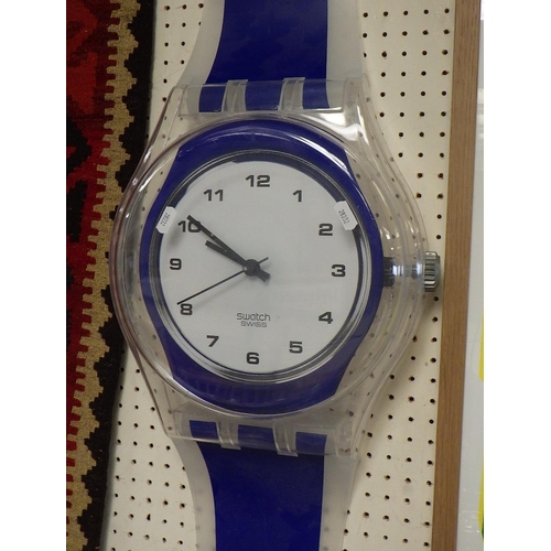 85 - A Swatch watch novelty wall clock