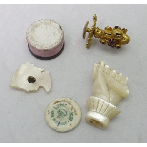 394 - A carved hand, mother of pearl; a Prince of Wales feather's finial; an enamel pot etc.  Hand 30mm ta... 