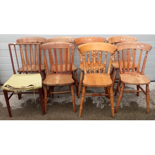 610 - A set of four slat back dining chairs together with four further kitchen chairs (8).