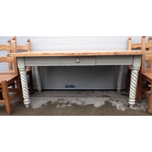 611 - A large pine kitchen table with painted base together with four beech chairs (5)