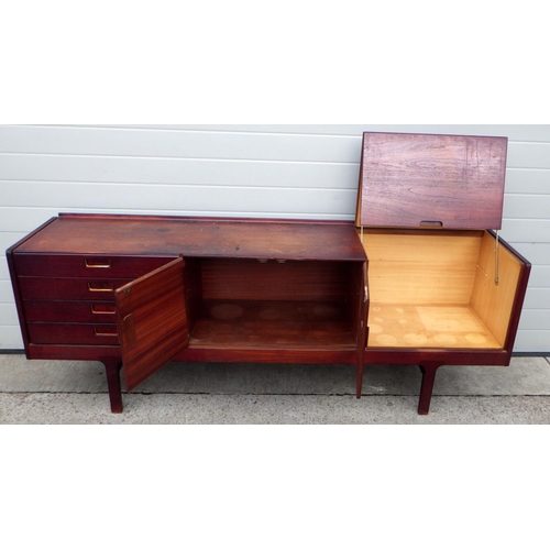 620 - A 1970's teak sideboard, marks, nicotine stained, 203cm long