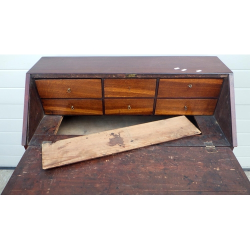 663 - A mahogany bureau, with well, a/f, 92cm wide