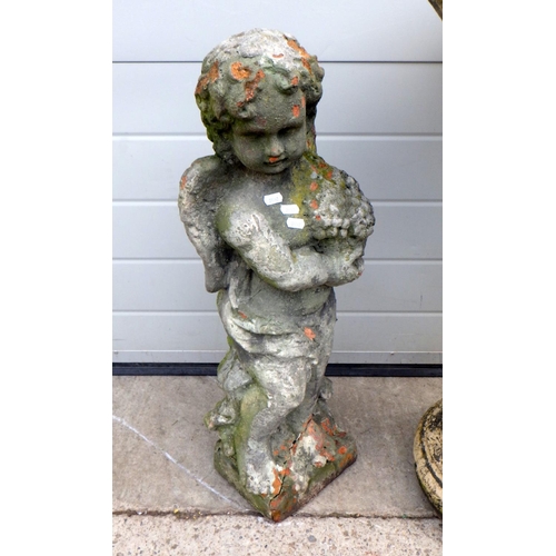 669 - A concrete bird bath 79cm tall together with a garden figure of aa cherub (a/f) (2)