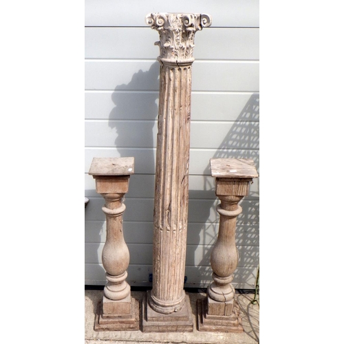 703 - A carved wooden Corinthian column 131cm tall, together with a pair of smaller columns, a consol tabl... 