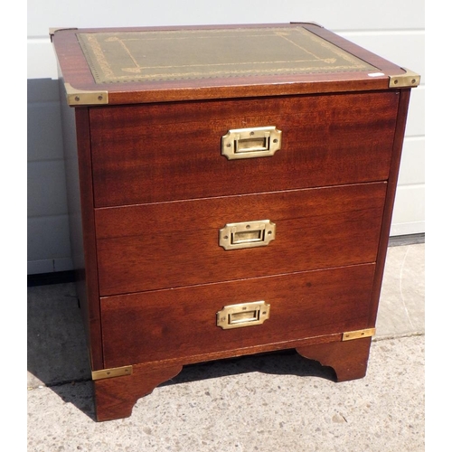 708 - A small reproduction Military style chest of drawers with leather inset top, brass bound corners and... 