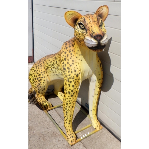 779 - A large fabric figure of a leopard on a metal frame, approx 135cm tall