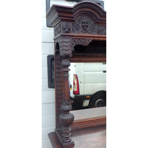 795 - A Victorian mask carved oak mirrorback sideboard, top moulding a/f, 185cm wide