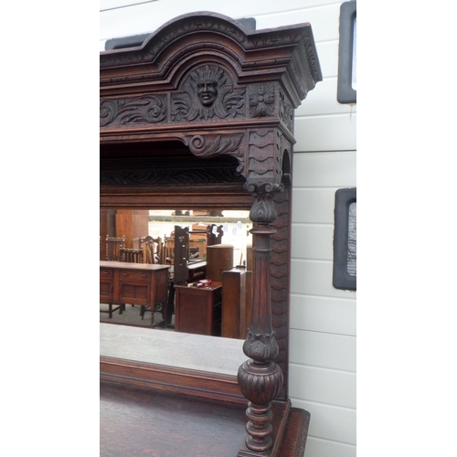 795 - A Victorian mask carved oak mirrorback sideboard, top moulding a/f, 185cm wide