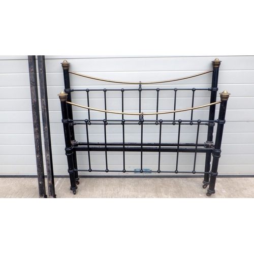 804 - A Victorian black painted metal double bed frame, 140cm wide