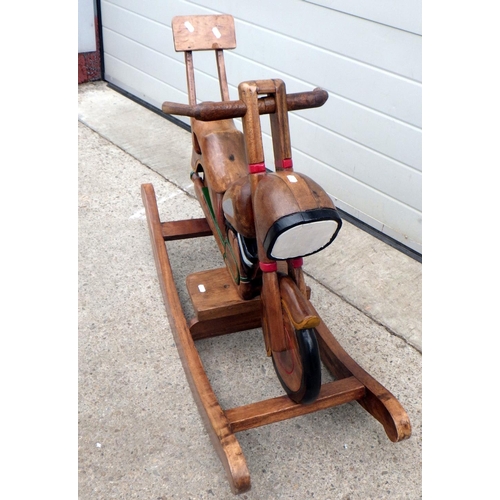 810 - A child's wooden rocking motorbike, 98cm x 70cm