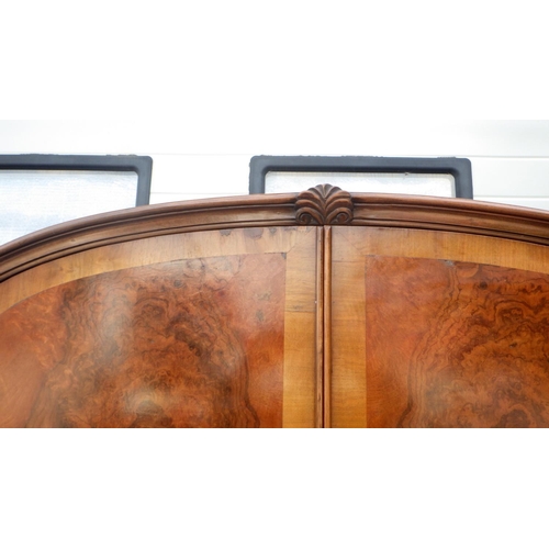 853 - A Burr walnut double wardrobe with arched top on cabriole feet. 122cm wide.