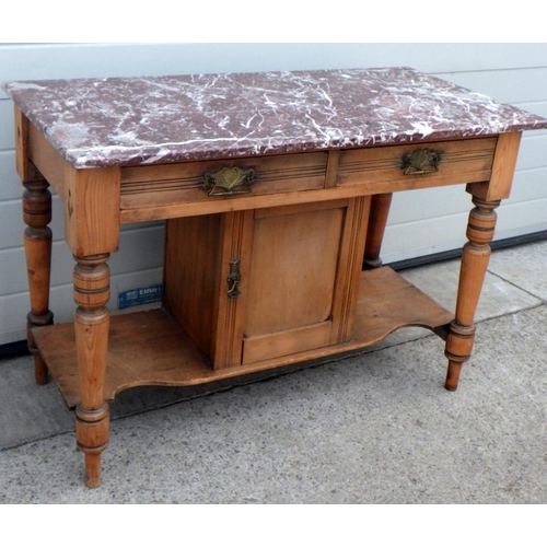 854 - An late Victorian stripped marble topped wash stand, missing back. (107cm wide.)