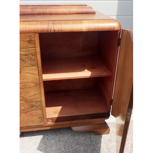 858 - A 1930's walnut continental sideboard (180cm long) with matching two door cupboard, with oak/ply top... 