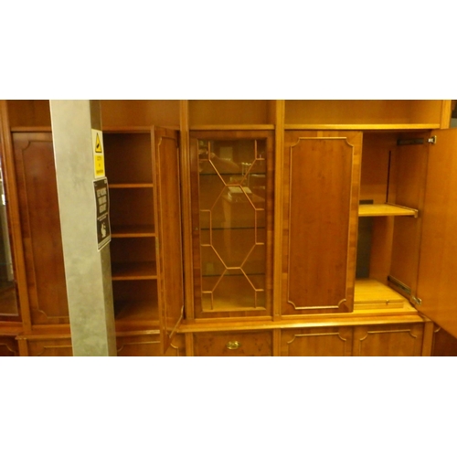 860 - A large reproduction yew side cabinet (approx. 360cm long)