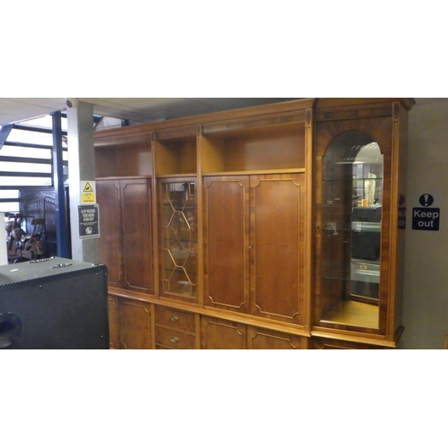 860 - A large reproduction yew side cabinet (approx. 360cm long)