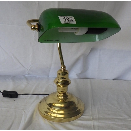 105 - A brass desk lamp having green glass shade