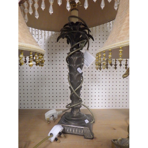 114 - A pair of modern table lamps and two others.  (4)