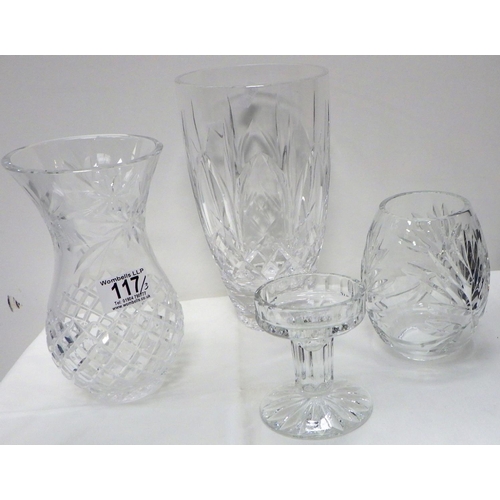 117 - A glass two-piece hurricane lamp; two glass vases, two knife rests and a silver loaded candlestick (... 