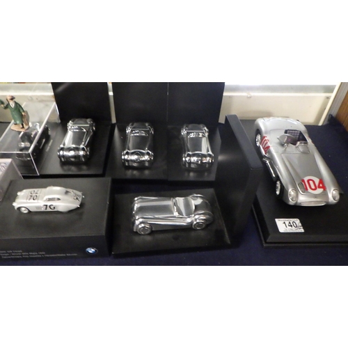 140 - A collection of die-cast car models and car-shaped bookends.  Some a/f