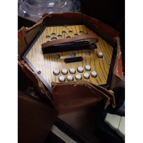 160 - A concertina, a Stylophone, musical instruments, sheet music etc. (2)