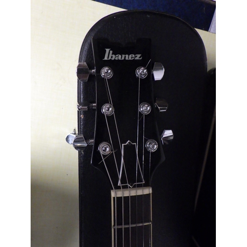 193 - An Ibanez model AN-?? guitar in hard case; a Gibson guitars soft case. (2)