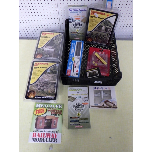 216 - Model railways landscaping accessory kits; two Dragon tank kits etc.