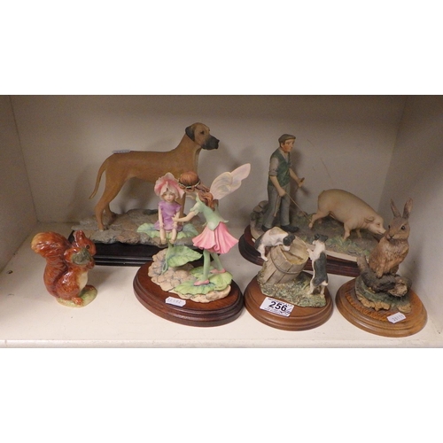 256 - A group of various figures to include Nao, Border Fine Arts, Beswick etc (11).