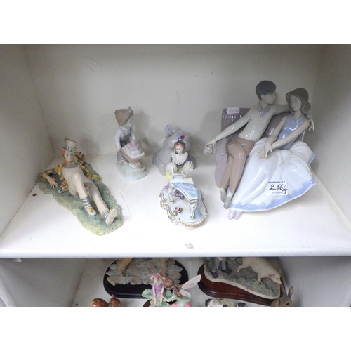 256 - A group of various figures to include Nao, Border Fine Arts, Beswick etc (11).