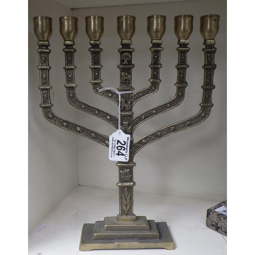 264 - A brass Menorah candelabra 31cm tall