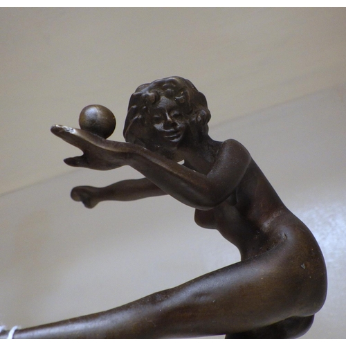 274 - A modern bronze figure on a marble base together with small cast metal figure (re attached at the fo... 