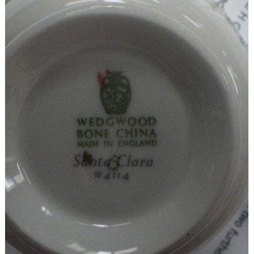 332 - A large Wedgwood Santa Clara dinner and tea service to include 2 tureens, 2 sauce boats & stands, 3 ... 