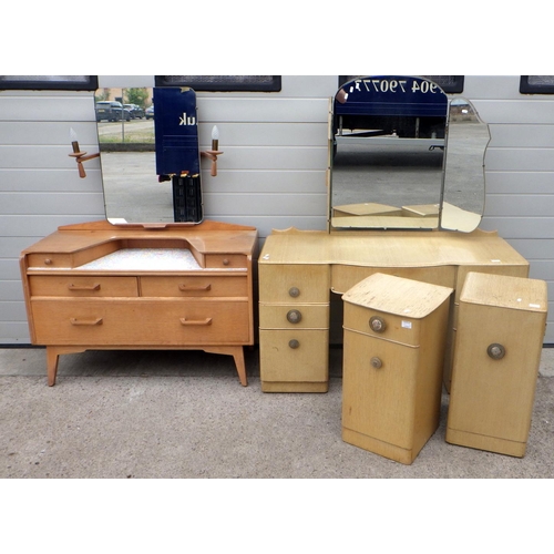 716 - A 1950's oak dressing table together with a further dressing table with 2 bedside cabinets (4)